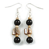 Black Glass and Antique White Shell Bead Drop Earrings with Silver Tone Closure - 6cm Long