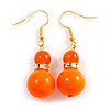 Neon Orange/ Rusty Orange Acrylic/ Glass Bead with Ab Crystal Ring Drop Earrings in Gold Tone - 45mm L