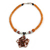 Brown Shell Flower Pendant with Pale Orange Glass Bead Necklace - 38cm L