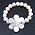 12mm Off White Freshwater Pearl Flex Bracelet With A Mother Of Pearl Central Flower - 17cm L