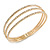 Delicate 3 Strand Clear Crystal Flex Cuff Bracelet in Gold Tone Metal - Adjustable
