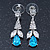 Clear/ Teal Blue CZ, Crystal Drop Sensation Earrings In Rhodium Plating - 37mm L - view 2