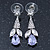Clear/ Amethyst CZ, Crystal Drop Sensation Earrings In Rhodium Plating - 37mm L