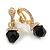 Striking Small Crystal Hoop with a Black Glass Bead Clip On Earrings In Gold Plated Metal - 30mm Long