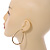 Medium Thick Etched Oval Hoop Earrings In Gold Tone - 55mm L - view 4