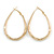 Medium Thick Etched Oval Hoop Earrings In Gold Tone - 55mm L - view 5