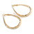 Medium Thick Etched Oval Hoop Earrings In Gold Tone - 55mm L - view 6